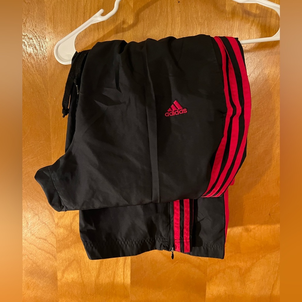 Adidas women Jogging pants in size L.